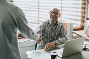 Businessman in an office shaking hands